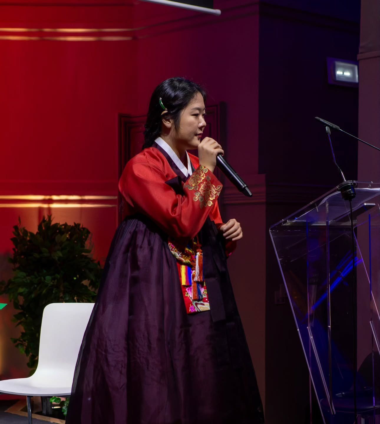 Habbine Estelle Kim in hanbok speaking at the CCICF Gala