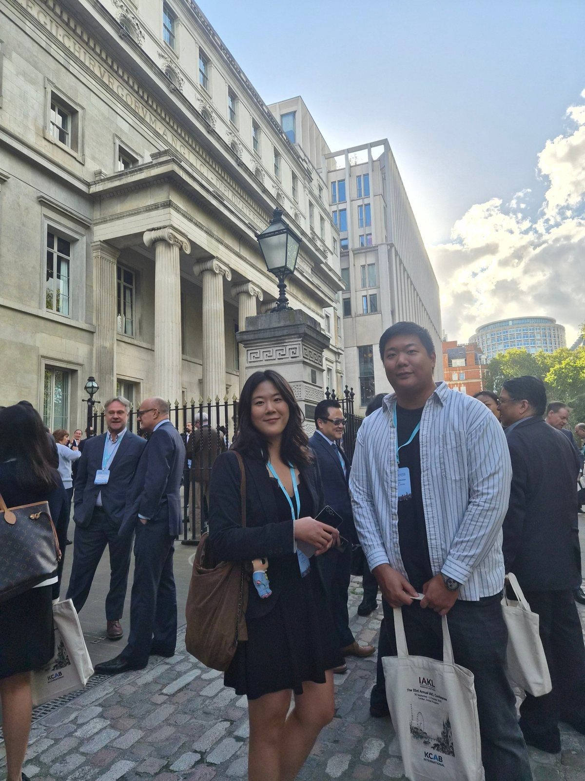 Conference delegates outside the venue in London