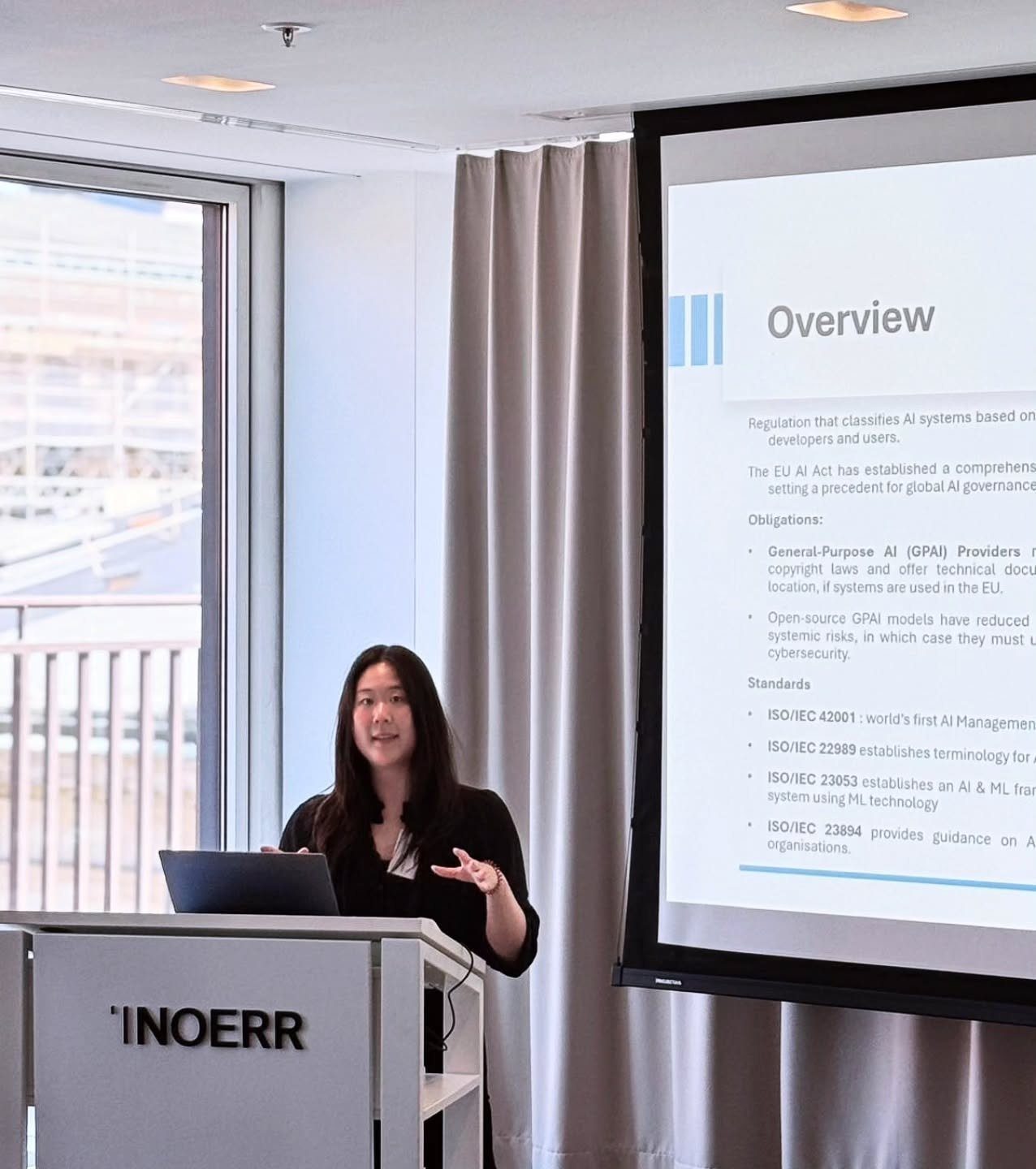 Habbine Estelle Kim presenting on the EU AI Act